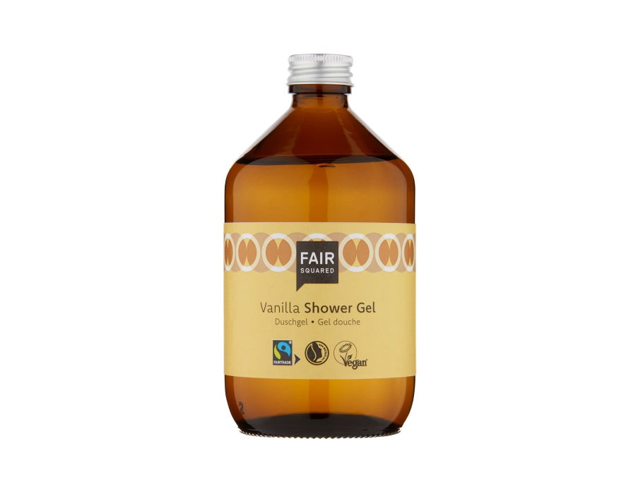 Fair Squared Vanilla Shower Gel in een amberkleurige glazen fles met zilveren dop en zachtgeel etiket; fairtrade en vegan douchegel met vanille.