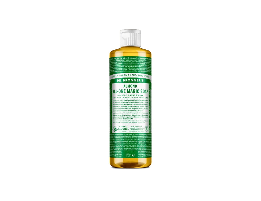 Grote transparante fles Dr. Bronner’s Almond All-One Magic Soap met groene label en witte dop; biologische vloeibare zeep van 473 ml.