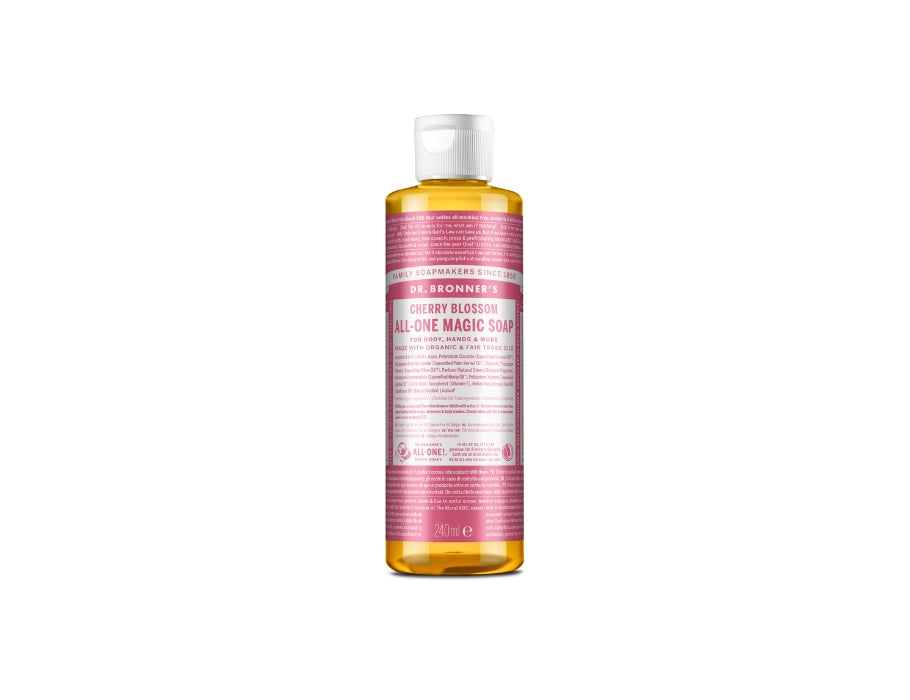 Transparante fles Dr. Bronner’s Cherry Blossom All-One Magic Soap met roze label en witte dop; biologische vloeibare zeep van 240 ml.