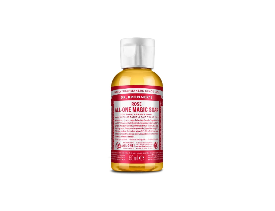 Kleine fles Dr. Bronner’s Rose All-One Magic Soap 60 ml met roze label en witte dop; biologische vloeibare zeep met zachte rozengeur.