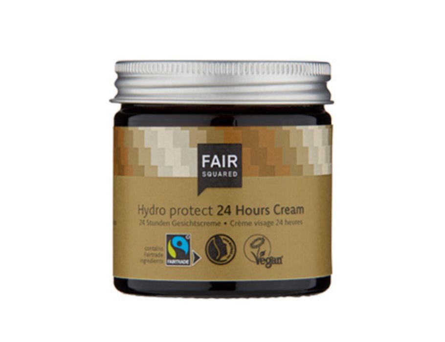 Fair Squared Hydro Protect 24 Hours Cream in een donkerbruin glazen potje met zilveren schroefdop en beige-bruin etiket met grafisch patroon; fairtrade en vegan 24-uurs gezichtscrème.
