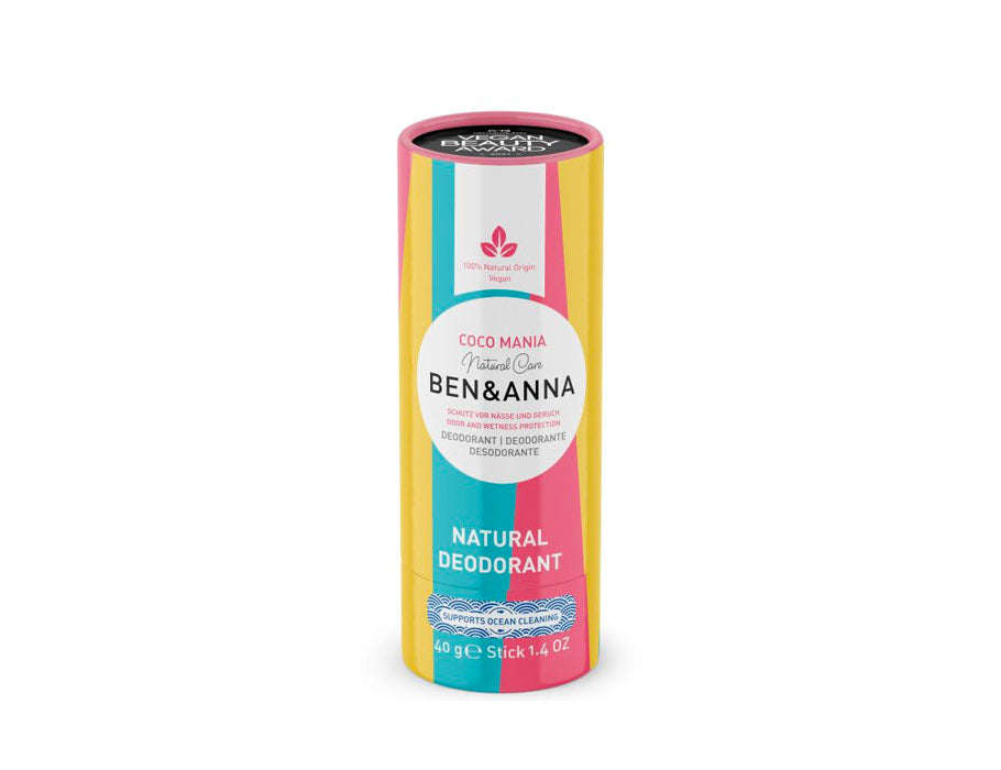 Ben & Anna Coco Mania natuurlijke deodorantstick in kleurrijke kartonnen verpakking met roze, geel en turquoise strepen, vegan en ocean-cleaning supporter.