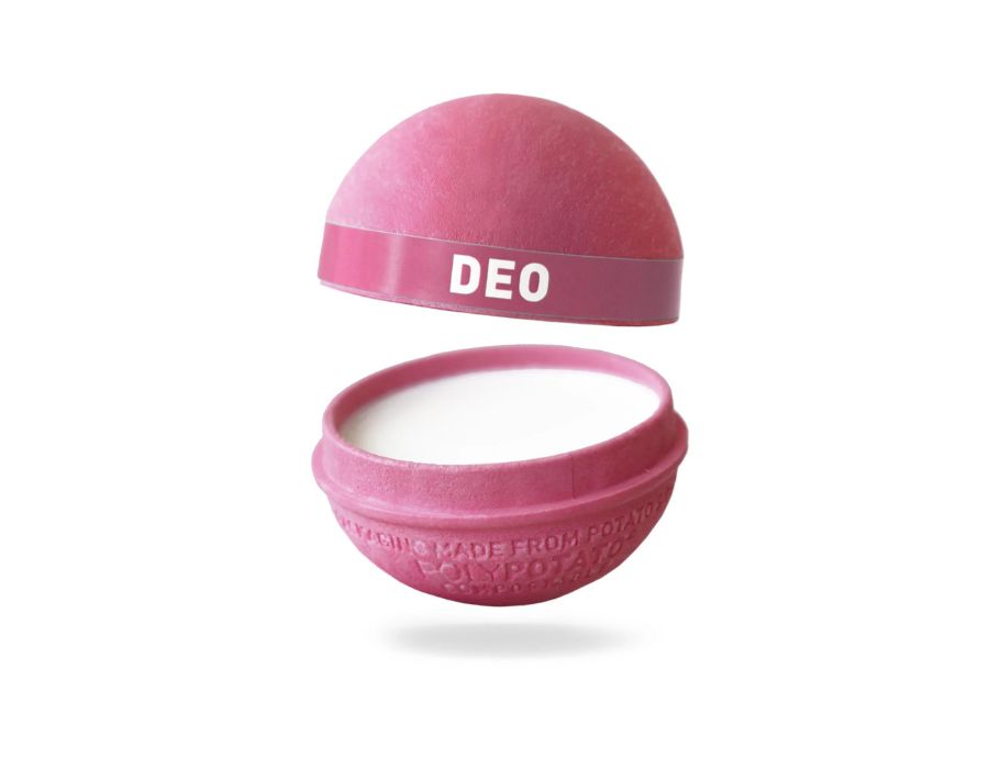 Roze ronde Ben & Anna deodorantbal van composteerbare PolyPotato®-verpakking, geopend zodat de witte deodorantcrème zichtbaar is; de bovenste helft zweeft boven de onderkant.