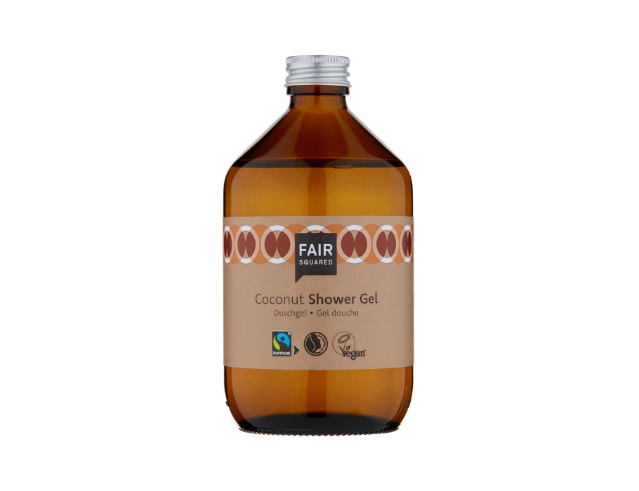Fair Squared Coconut Shower Gel in een amberkleurige glazen fles met zilveren dop en beige etiket; fairtrade en vegan douchegel met kokos.